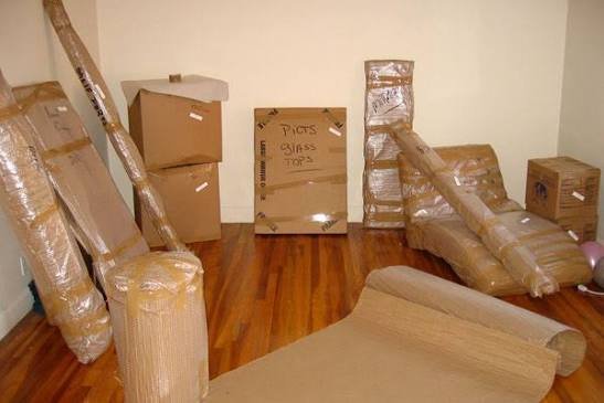 Wrapped furniture and household goods prepared for careful moving