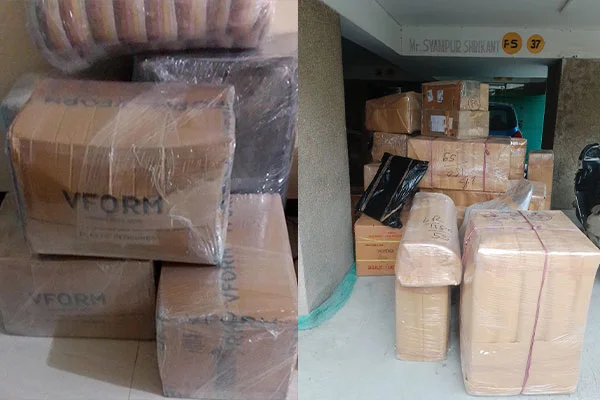 Household goods packed and staged for loading into the moving vehicle
